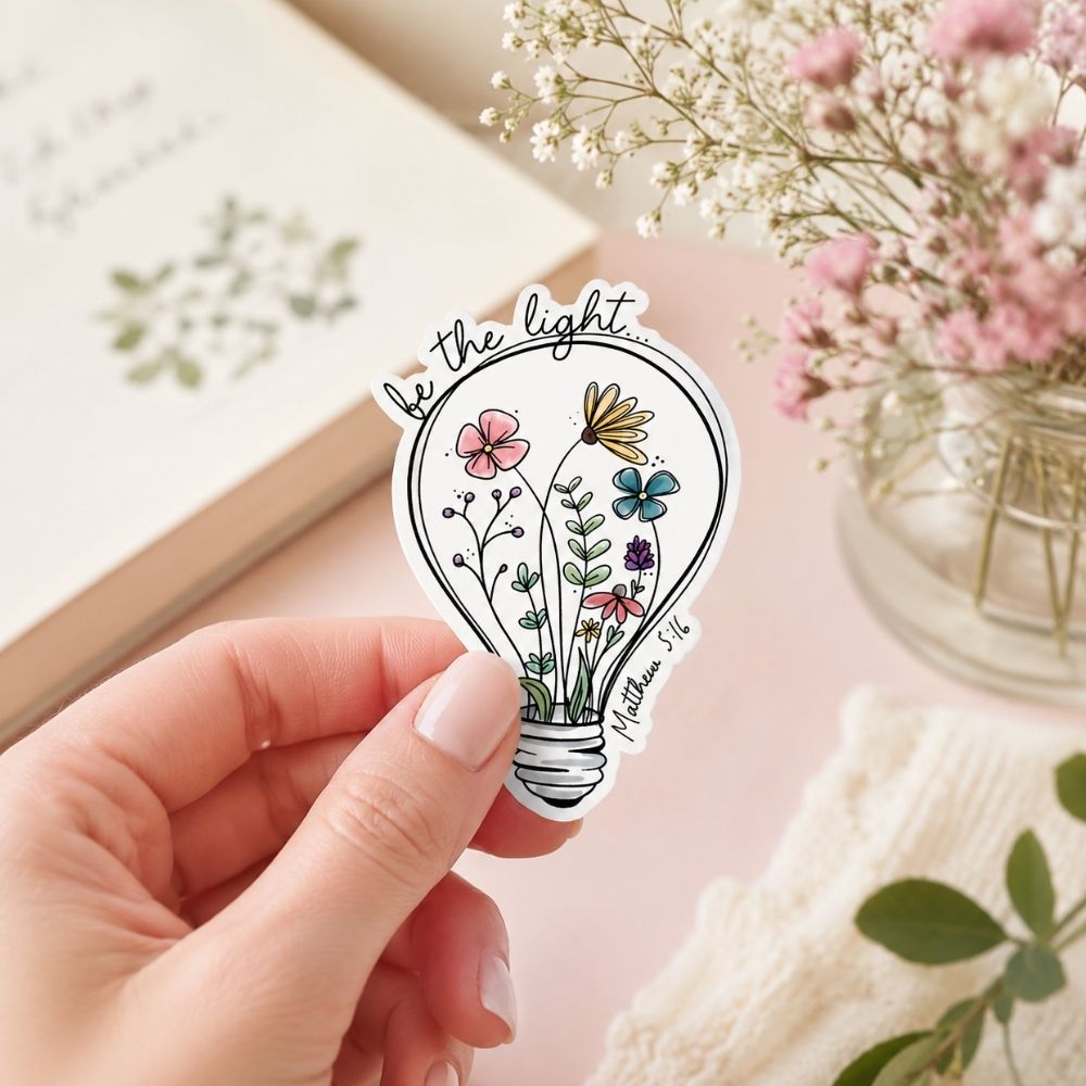 Matthew 5:16 flower lightbulb sticker in cozy pastel setting, uplifting Christian accessory with botanical design