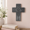 confirmed in christ hanging wall cross near books and a plant
