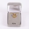 Mustard seed heart gold necklace placed in Majesty box