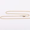 Mustard seed heart gold necklace placed in Majesty box