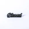 Blessed auto emblem in silver color