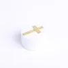Gold cross with amazing grace written on it
