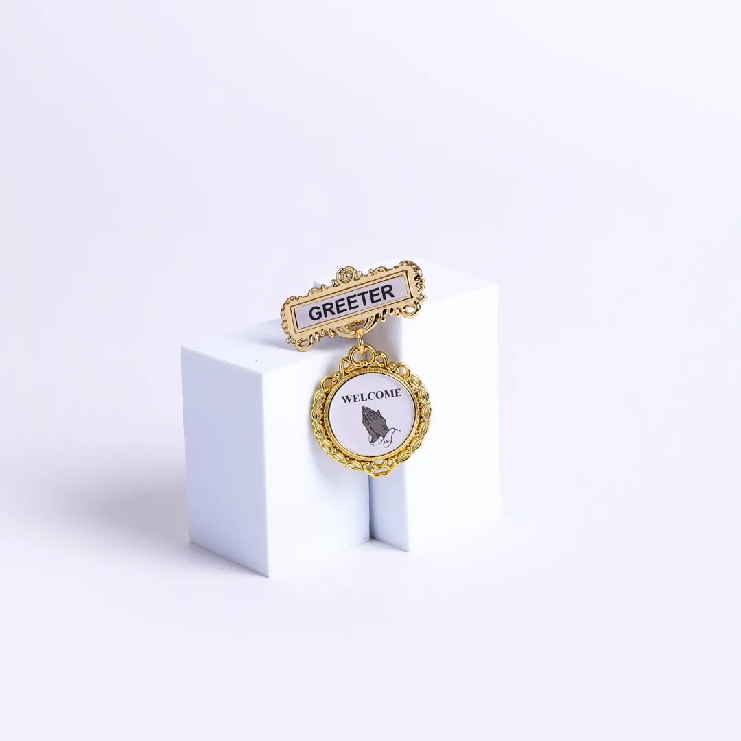 Badge - Fancy Round - Greeter - Ethnic Praying Hands - Pin | Swanson Christian Products