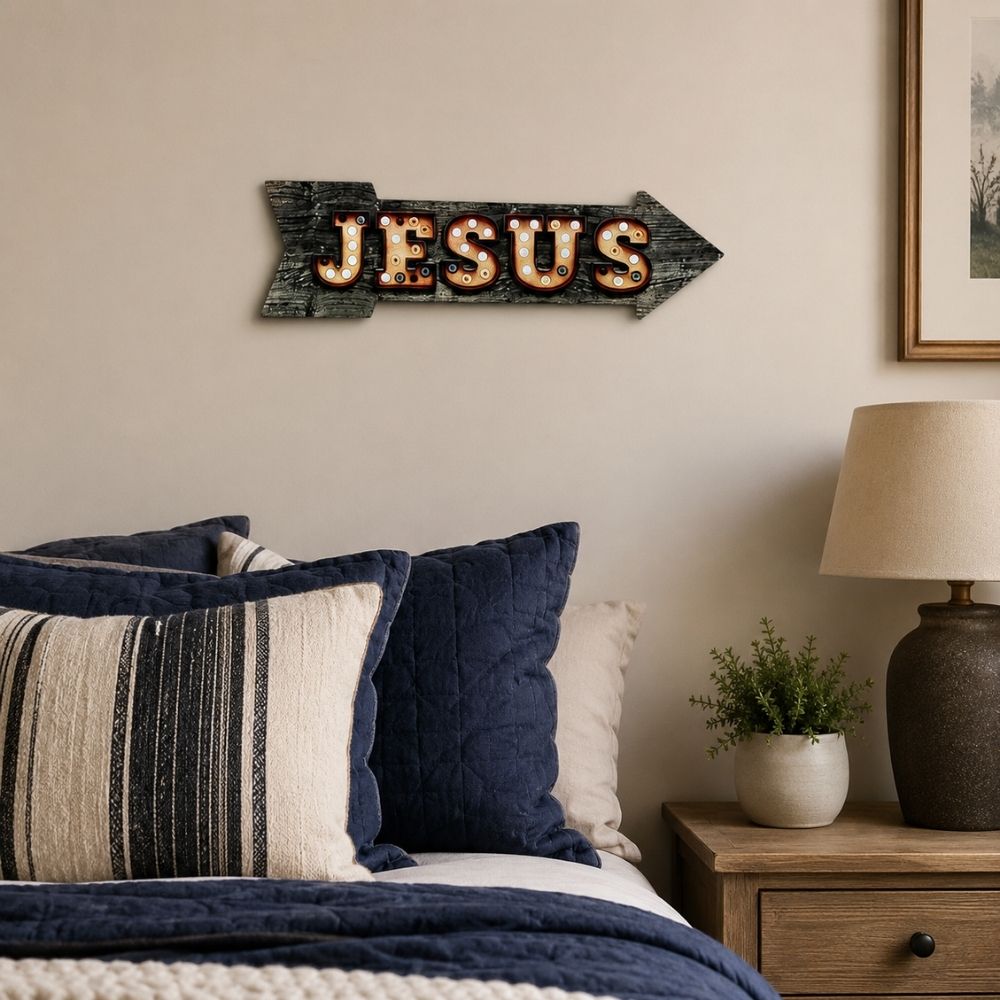 Jesus arrow wall sign displayed above a cozy bedroom, Christian bedroom decor, faith-inspired wall art, religious home decoration, Jesus-themed metal sign, inspirational Christian room accent, rustic faith-based decor.