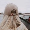 I love Jesus back of tan Christian baseball cap on girl