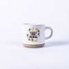 White latte mug with Kind honey bee on it