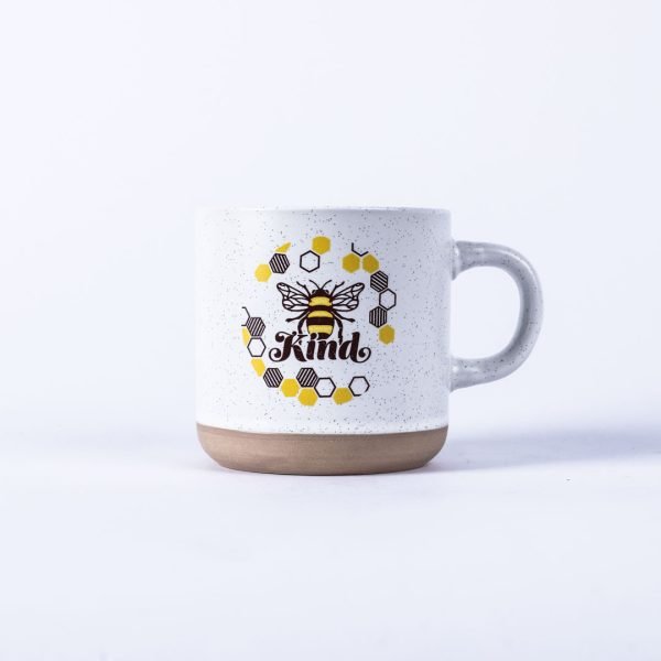 White latte mug with Kind honey bee on it