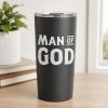 Christian father relaxing on a porch while drinking from a black tumbler featuring the “MAN OF GOD” design, enjoying a peaceful morning in a faith-inspired setting.